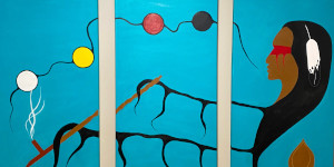 Painting of an indigenous person's head on a blue background