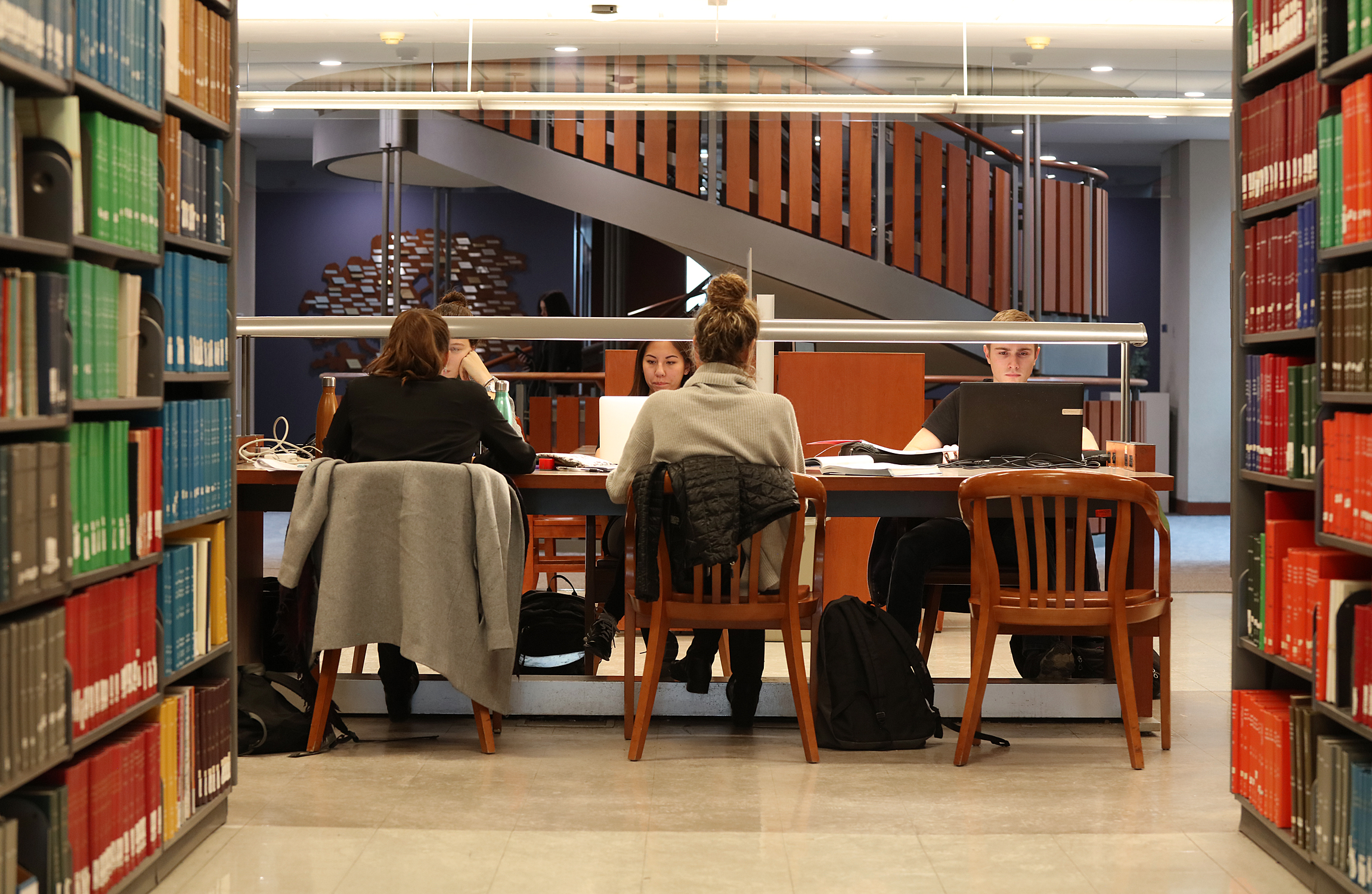 Students studying in library.