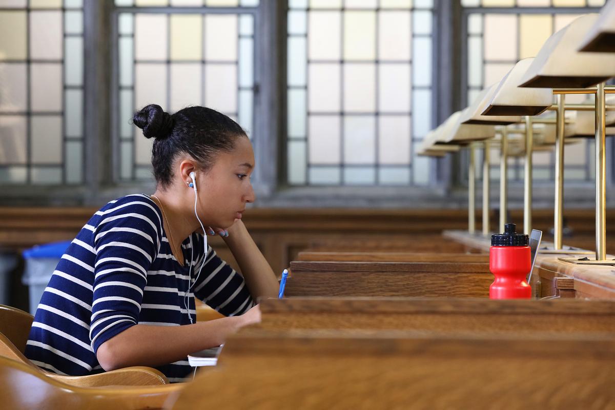 a student studying in Douglas Library