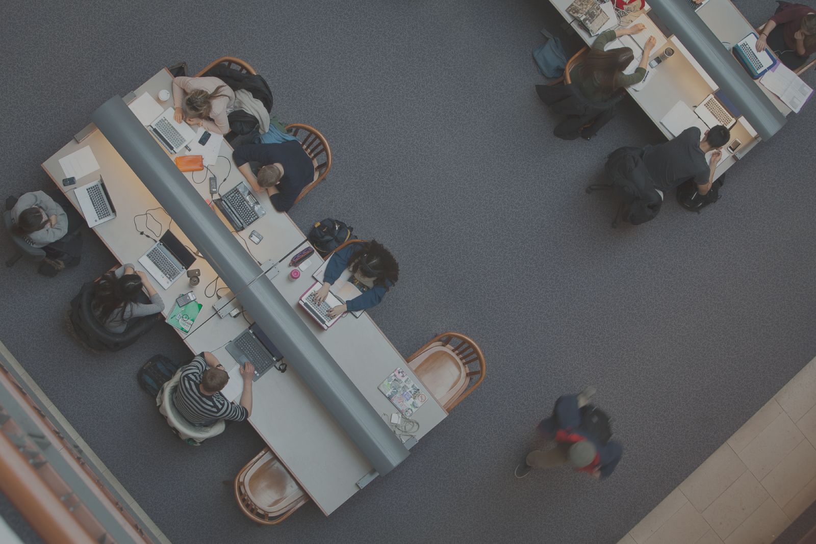 students in library shot from above