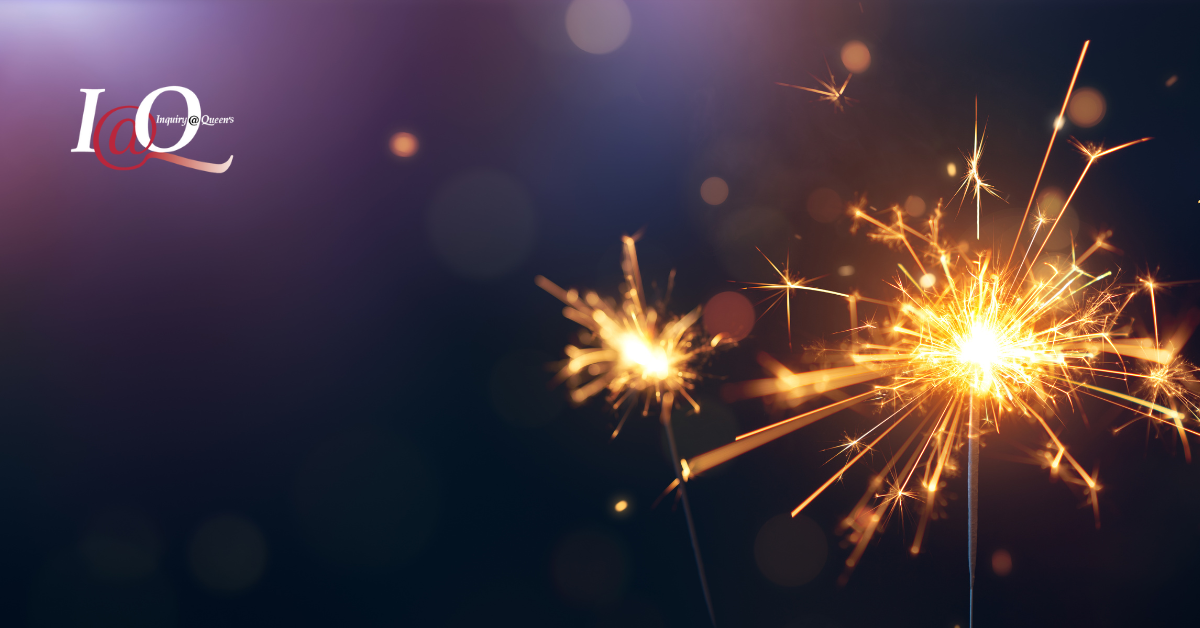 two sparklers in the dark