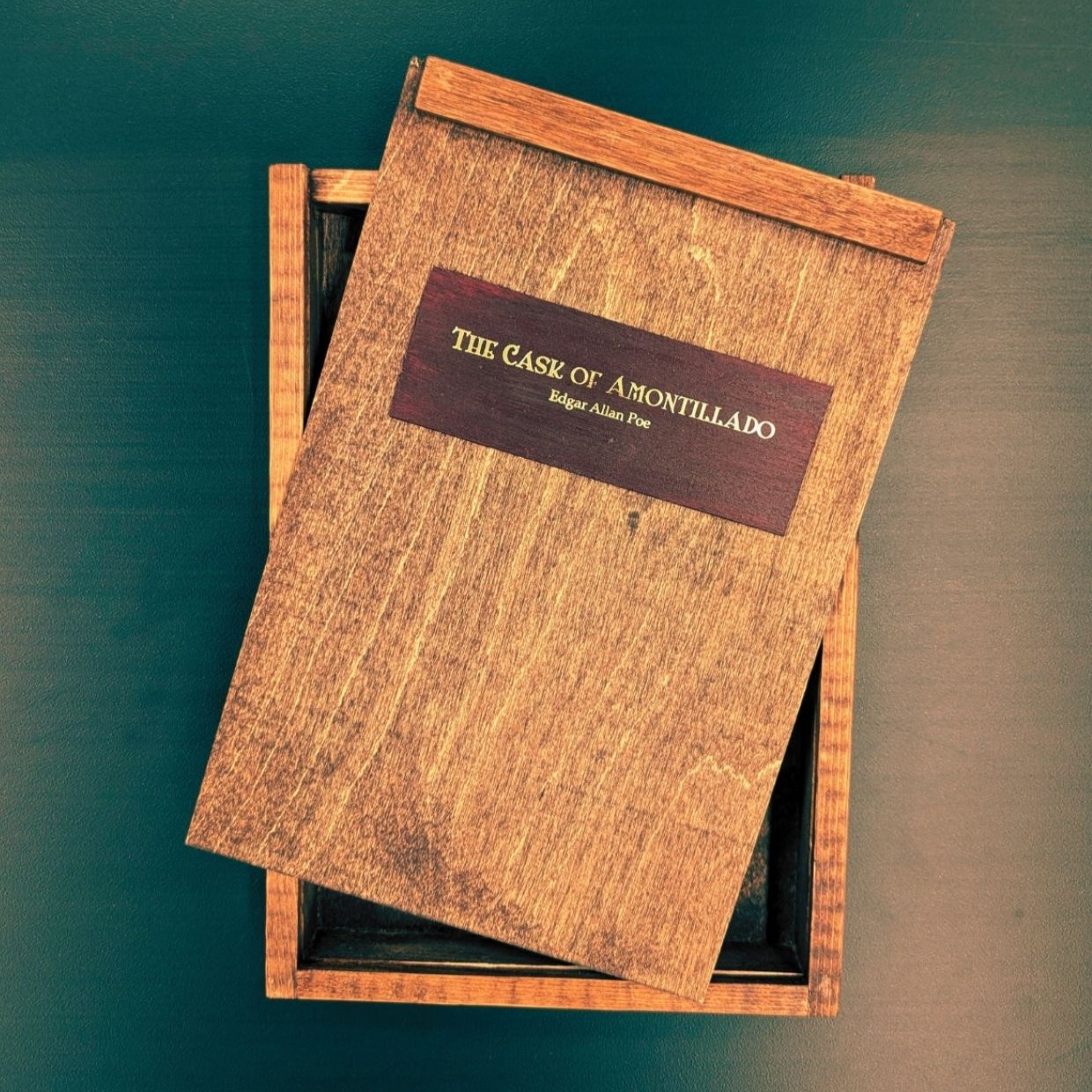 Wooden box containing The Cask of the Amontillado by Edgar Allen Poe.