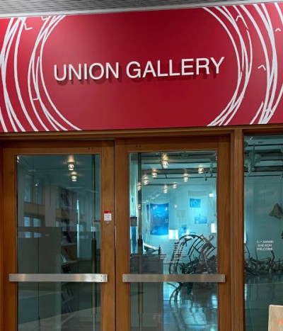 Outer glass doors and main sign for the Union Gallery