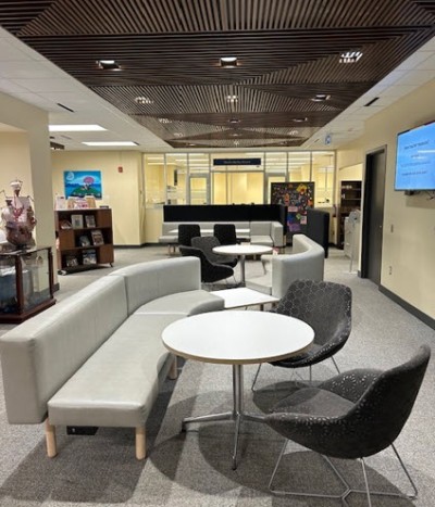 Grey chairs and benches in the Education Library