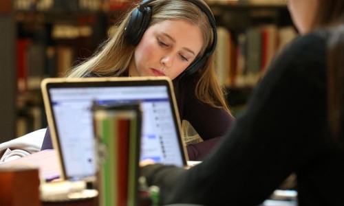 Students studying at the library